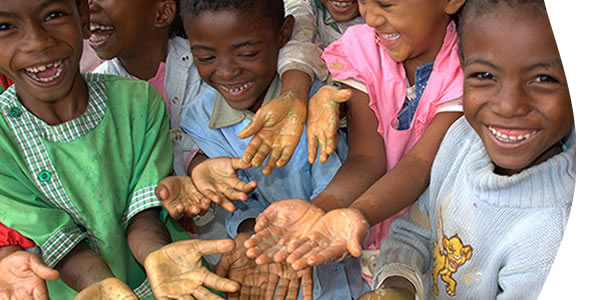 kids smiling showing their hands washed