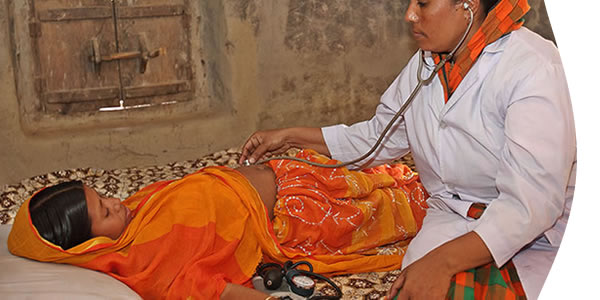 mother providing medicine to child